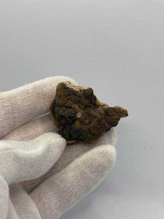 IRIDESCENT PYRITE ON CALCITE - BROKEN HILL, NEW SOUTH WALES